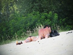 Hot couple of beach nudists voyeured on spycam from behind