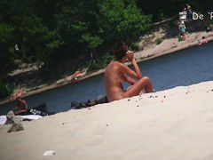 Sexy beach nudists got on voyeur cam with natural bodies