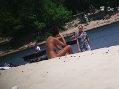 Sexy beach nudists got on voyeur cam with natural bodies