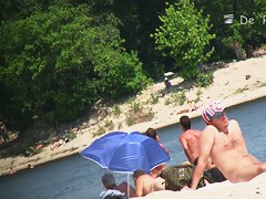 Sexy beach nudists got on voyeur cam with natural bodies