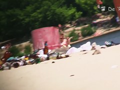 Sexy beach nudists got on voyeur cam with natural bodies