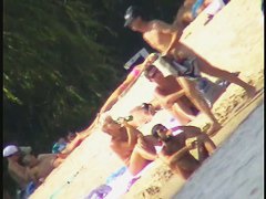 Sexy naked people in a beach voyeur video