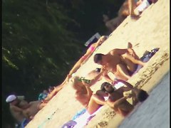 Sexy naked people in a beach voyeur video