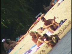 Sexy naked people in a beach voyeur video