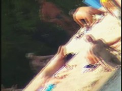 Sexy naked people in a beach voyeur video