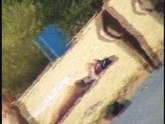 Sexy naked people in a beach voyeur video