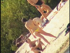 Sexy naked people in a beach voyeur video