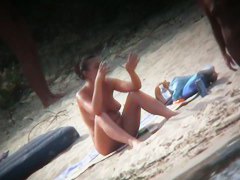 Naked brunette woman nude beach candid video