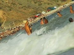 Hidden cam beach catches sexy nudist women sunbathing