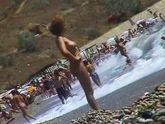 Real beach voyeur video of hot nudist chicks showing off their bodies by the water