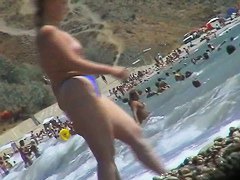 Real beach voyeur video of hot nudist chicks showing off their bodies by the water