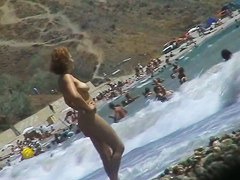 Real beach voyeur video of hot nudist chicks showing off their bodies by the water