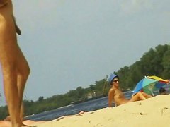 Amateur milfs on a hidden nudist beach cam