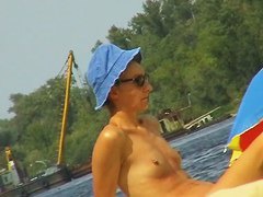 Amateur milfs on a hidden nudist beach cam