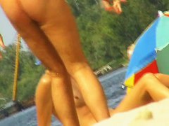 Amateur milfs on a hidden nudist beach cam