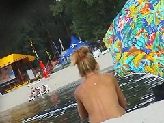 Lewd hunter with beach spy cam records sexy nudist girl