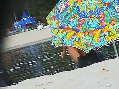 Lewd hunter with beach spy cam records sexy nudist girl