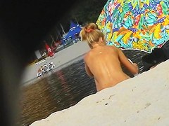 Lewd hunter with beach spy cam records sexy nudist girl