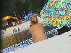 Lewd hunter with beach spy cam records sexy nudist girl