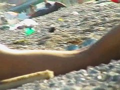 Several sexy nude girls caught on a beach with a spy cam