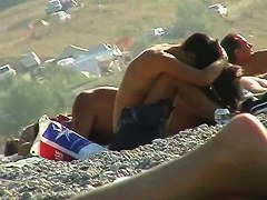 Several sexy nude girls caught on a beach with a spy cam