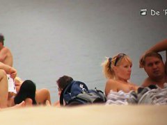 Blonde model on the nude beach voyeur video