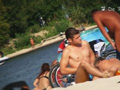 Lewd hunter with camera records hot beach voyeur movie