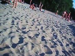 This beach has so many girls with naked boobs and asses