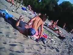 This beach has so many girls with naked boobs and asses