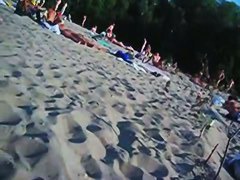 This beach has so many girls with naked boobs and asses
