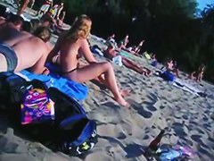 This beach has so many girls with naked boobs and asses