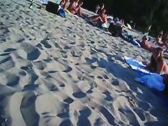This beach has so many girls with naked boobs and asses