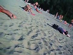 This beach has so many girls with naked boobs and asses