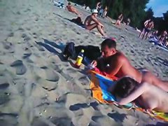 This beach has so many girls with naked boobs and asses