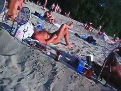 This beach has so many girls with naked boobs and asses