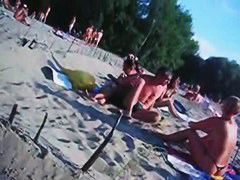 This beach has so many girls with naked boobs and asses