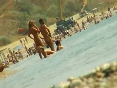 Sexy naked people in a beach spy voyeur video