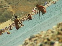 Sexy naked people in a beach spy voyeur video