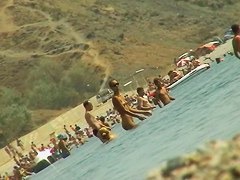 Sexy naked people in a beach spy voyeur video