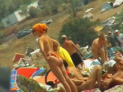 Sexy naked people in a beach spy voyeur video