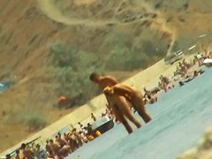 Sexy naked people in a beach spy voyeur video