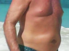 Nude beach hidden cam shoots the sexiest tan oiled bodies