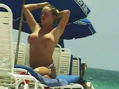 Big breasted bunnies filmed on a nudist beach