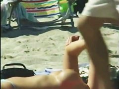 Big breasted bunnies filmed on a nudist beach