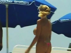 Big breasted bunnies filmed on a nudist beach