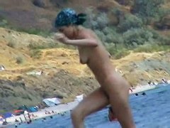 Free nudist beach avi of a crowd of naked people