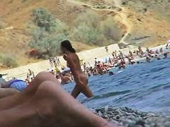 Free nudist beach avi of a crowd of naked people