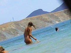 Free nudist beach avi of a crowd of naked people