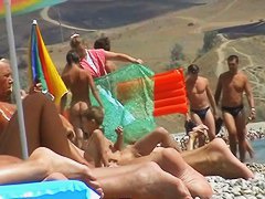 Free nudist beach avi of a crowd of naked people