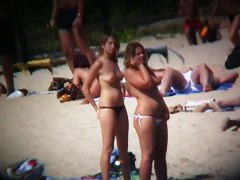 Sexy whores with awesome boobs and asses on the beach